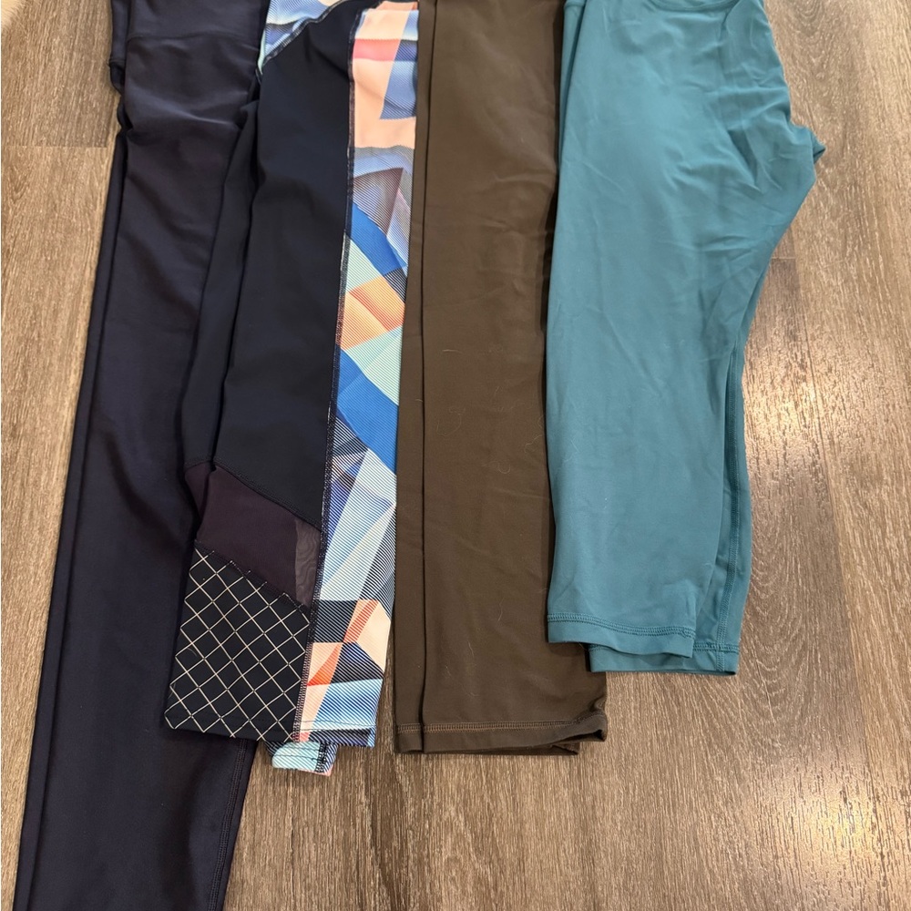 Lot of 4 Athleta Women's Leggings in Navy, Geometric Blue, Olive, and Teal